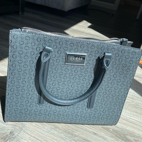 Guess Handbags - Multi compartment Guess structured back purse, some scratches on handle